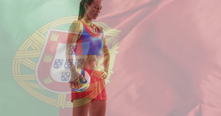 Image of flag of portugal over caucasian female volleyball player. Global sports, sport disciplines and flags concept digitally generated image.の写真素材
