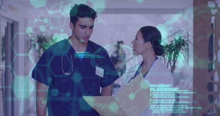 Image of scientific data processing over diverse doctors. Global medicine, computing and data processing concept digitally generated image.の写真素材