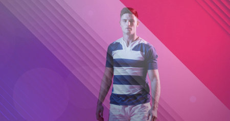 Image of flag of france over caucasian male rugby player. Sports, competition and active lifestyle concept digitally generated image.の写真素材