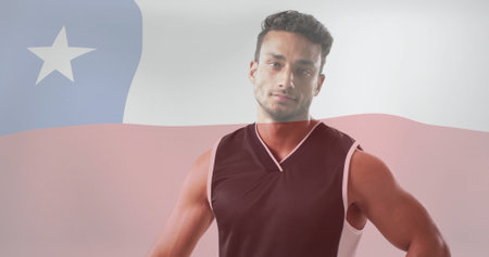 Image of flag of chile over biracial male volleyball player. Global sports, sport disciplines and flags concept digitally generated image.の写真素材