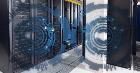 Image of two blue round scanner spinning against computer server room. Computer interface and...