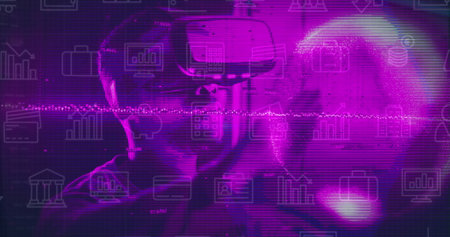 Image of data processing and icons over african american man in vr headset. Global computing, digital interface and data processing concept digitally generated image.の写真素材
