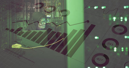 Image of binary coding over asian man using laptop by computer servers. Global computing, digital...