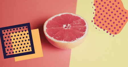 Image of abstract shapes over halved grapefruit on yellow and red background. Fruit, healthy diet and vegan fresh food concept digitally generated image.の写真素材