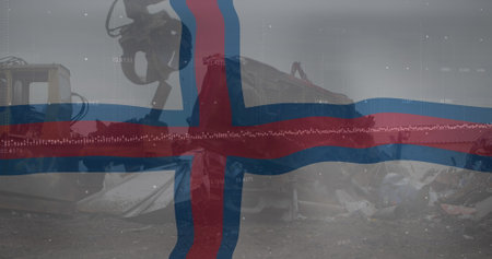 Image of wavingfaroe islands flag against hydraulic lifting machine at junkyard. Reuse and recycling conceptの写真素材