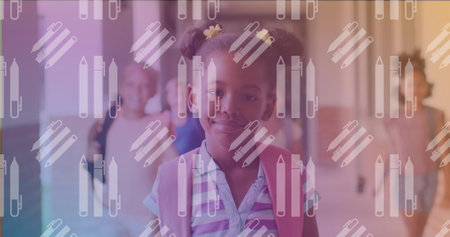 Image of pencils floating over happy african american girl. learning, education and back to school concept digitally generated image.の写真素材