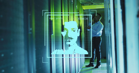 Image of changing profile icons over african american male engineer working at server room. Global networking and business data storage technology conceptの写真素材