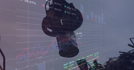 Image of multiple graphs, trading boards, crane grabbing metal scrap and dumping it in junkyard. Digital composite, report, business, stock market, garbage and recycling concept.の写真素材