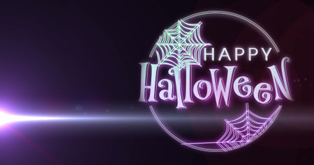 Image of happy halloween and spiders web over light and purple background. halloween tradition and celebration concept digitally generated image.の写真素材