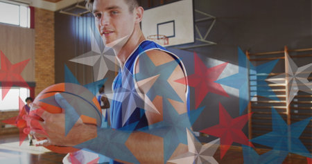 Caucasian fan holding basketball, wearing blue and white jersey. Others playing in blue background, all showing energetic movesの写真素材