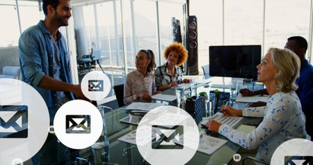 Image of social media data processing over diverse business people in office. Global teamwork, business, finances, computing and data processing concept digitally generated image.の写真素材
