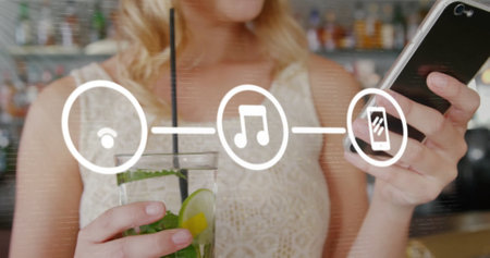 Image of flowchart over caucasian woman holding lemonade scrolling on smartphone. Digital composite, multiple exposure, communication, drink, beverage and technology concept.の写真素材