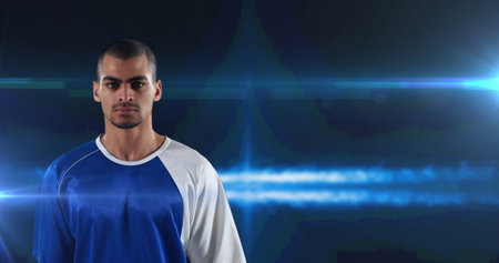 Image of basketball player over glowing blue background. sports and competition concept digitally generated image.の写真素材