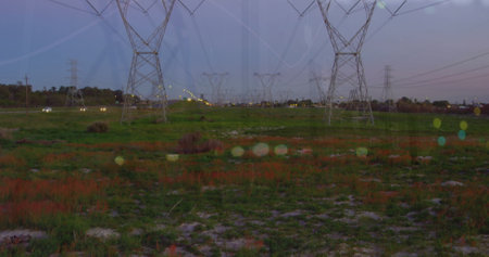 Image of financial graphs over electricity poles. electricity, finance and economy concept digitally generated image.の写真素材