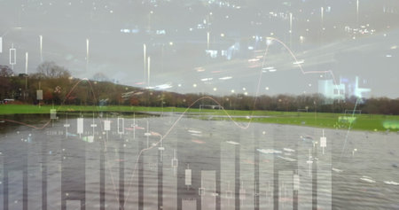 Image of financial graphs over agricultural field and landscape. agriculture, finance and economy concept digitally generated image.の写真素材