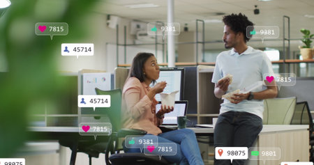 Image of social media notifications over diverse male and female office colleagues talking. Global...