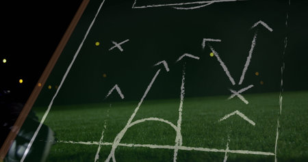 Image of networks of connections over football player. Sports competition and data processing concept digitally generated image.の写真素材