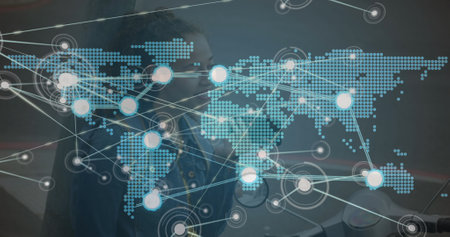 Image of network of connections with world map over biracial woman using smartphone. Global connections, networks and data processing concept digitally generated image.の写真素材