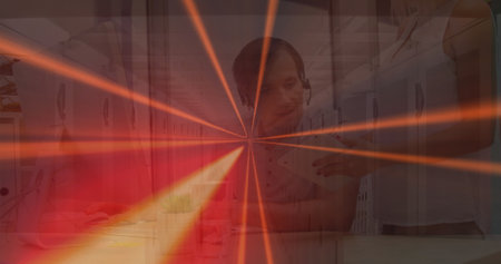 Image of qr code, lines over caucasian coworkers working. Business, network, connections, communication and technology concept digitally generated image.の写真素材