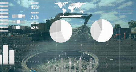 Scrap is being lifted by crane in a scrapyard on a sunny day. White business statistics are moving aligned towards the left against green screen.の写真素材
