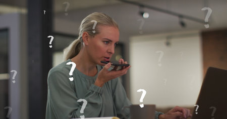 Image of question marks over caucasian businesswoman working at office. Global business, finances...