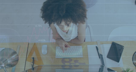 Image of financial data processing over biracial businesswoman working in office. Global business,...