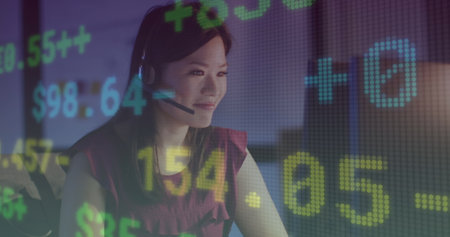 Image of financial data processing over biracial businesswoman. Global business, finances, computing and data processing concept digitally generated image.の写真素材