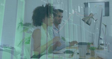 Image of graphs and changing numbers over diverse coworkers discussing reports on computer. Digital...