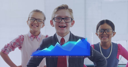 Image of financial data processing over diverse school children dressed as business people. Global business, bosses day and data processing concept digitally generated image.の写真素材