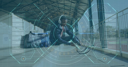 Image of data processing over disabled male athlete on sports stadium. global sports, disability and technology concept digitally generated image.の写真素材