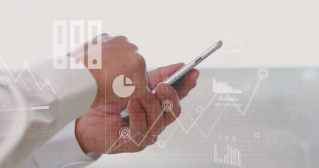 Image of financial data processing over caucasian businesswoman using smartphone in office. Global business, communication, computing and data processing concept digitally generated image.の写真素材