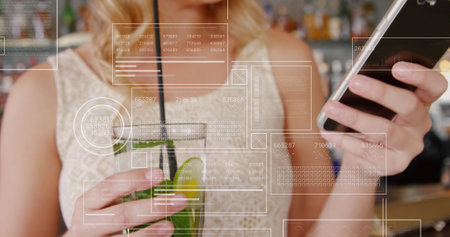Image of data processing over mid section of a caucasian woman using smartphone at a bar. Computer...
