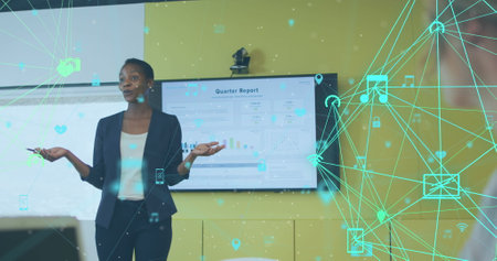 Image of connected icons over african american businesswoman presenting quarters reports. Digital...