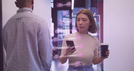 Image of dna strand spinning over asian businesswoman using smartphone in office. global research,...