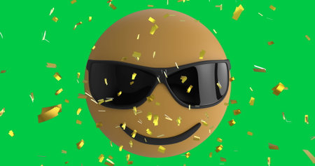 Image of confetti falling over smiling sunglasses emoji emoticon icon over green screen. global social media, celebration and communication concept digitally generated image.の写真素材