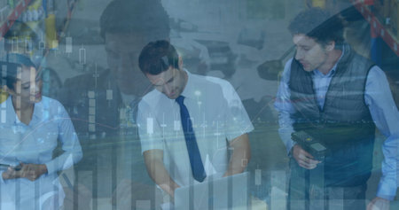 Two Caucasian men and a Hispanic woman examine a laptop together. All are wearing business attire, focusing on screen in office settingの写真素材