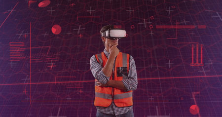 Image of diverse data and graphs over caucasian male engineer in vr headset. Architecture, engineering, economy and technology concept digitally generated image.の写真素材