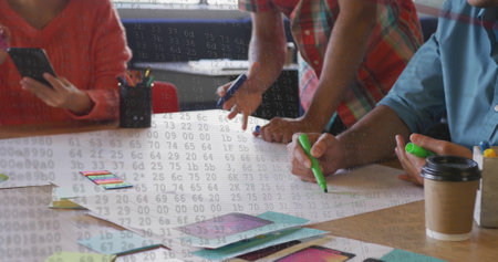 Image of multiple numbers over midsection of diverse engineer discussing floor plan on blueprint. Digital composite, multiple exposure, digits, planning, architecture and teamwork concept.の写真素材