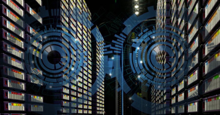 Image of two blue round scanners spinning against computer server room. Computer interface and business data storage technology conceptの写真素材