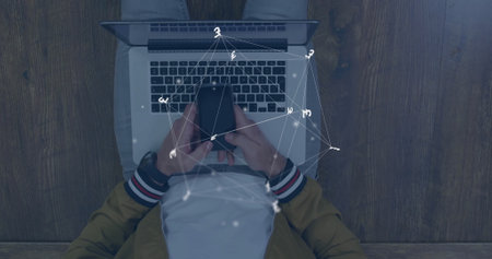 Image of connections and currency symbols over biracial man using smartphone. Global finance,...