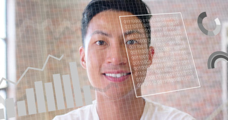 Image of financial data processing over asian businesman in office. Global finance, business, connections, computing and data processing concept digitally generated image.の写真素材