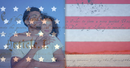 Image of american flag and constitution over happy diverse couple embracing on sunny beach. America,...
