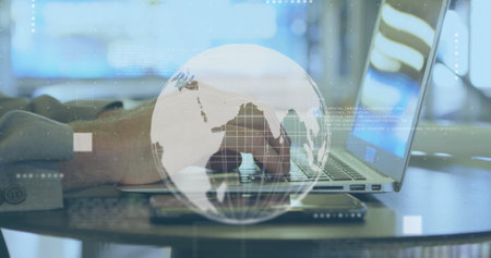 Image of globe with data processing over caucasian man using laptop. Global finance, business,...