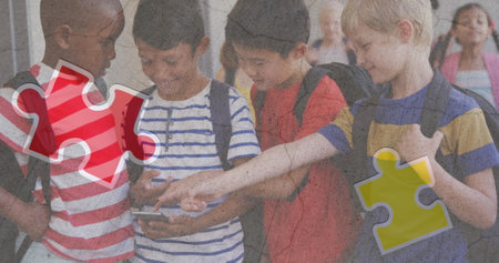 Jigsaw puzzle and human head icon against diverse group of boys using smartphone at school