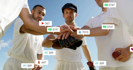 Image of social media icons with growing numbers over diverse male cricket players teaming upの写真素材
