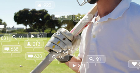 Image of social media icons with growing numbers over caucasian male cricket player