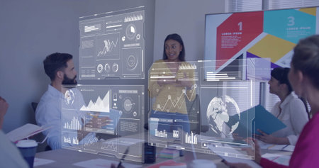 Image of financial data processing over diverse business people in officeの写真素材