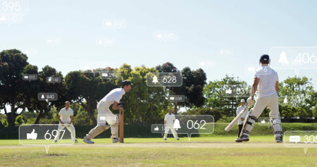 Image of social media icons with growing numbers over diverse male cricket playersの写真素材