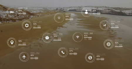Image of network of icons and data processing over landscape. Global connections, computing and data processing concept digitally generated image. image of network of icons and data processingの写真素材