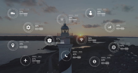 Image of network of icons and data processing over landscape. Global connections, computing and data processing concept digitally generated image.の写真素材